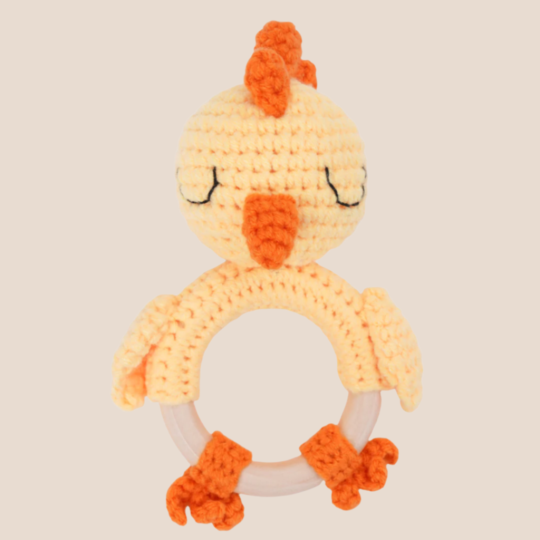 hand-knitted chick baby toy with cotton yarn and a non-toxic beech wood ring front view