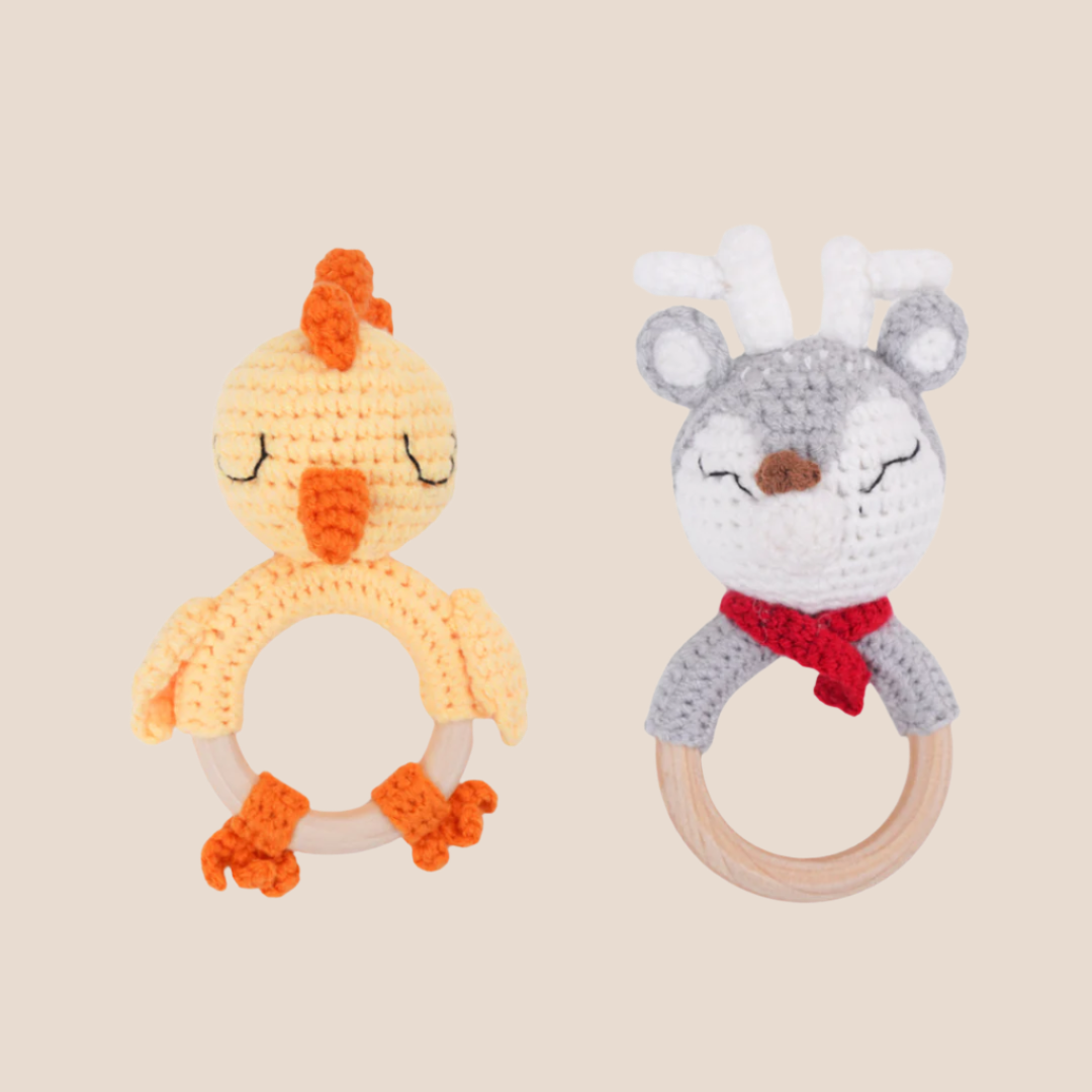 hand-knitted chick baby toy with cotton yarn and a non-toxic beech wood ring. Safe, durable, and perfect for sensory play. Shop now!