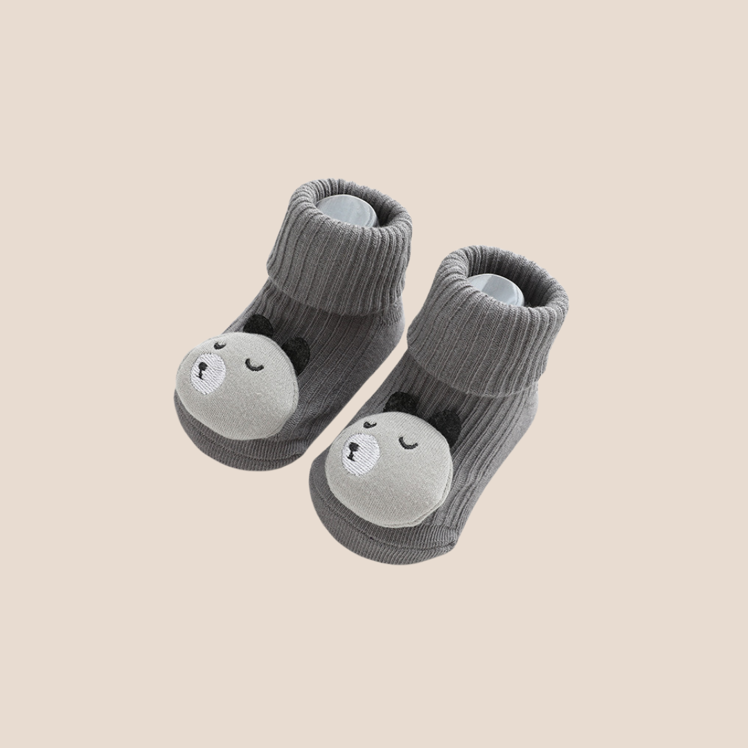 Gray baby socks with cute bear face toe plush – perfect for newborn gift baskets and registries