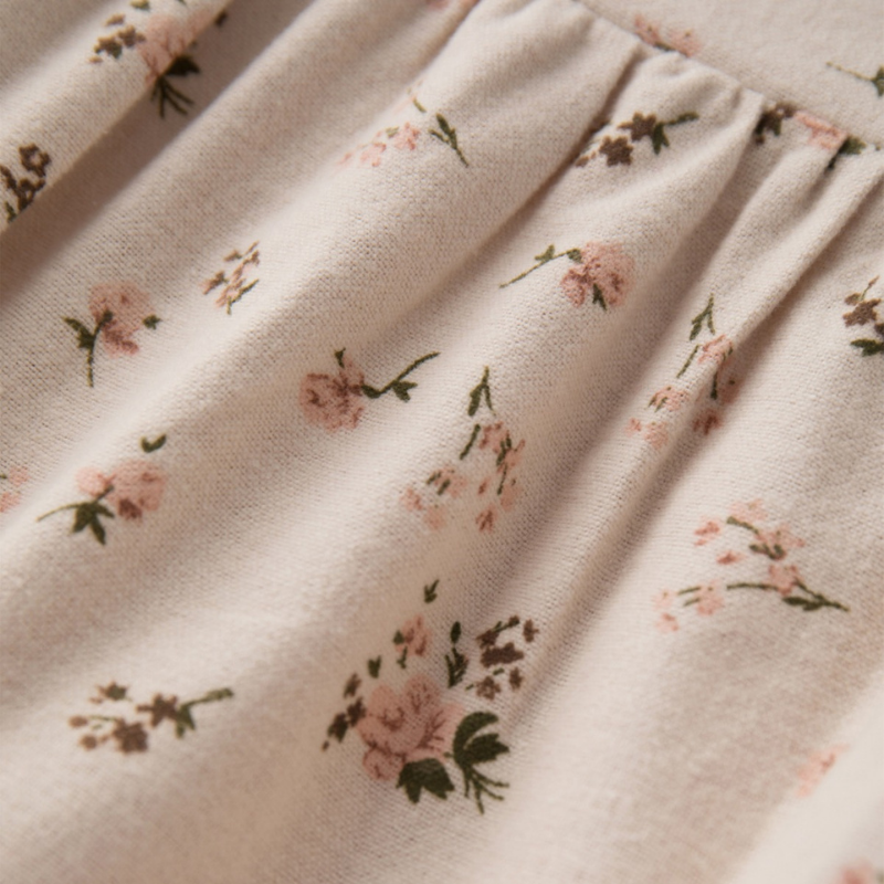 Soft brushed cotton pink baby romper with floral print details