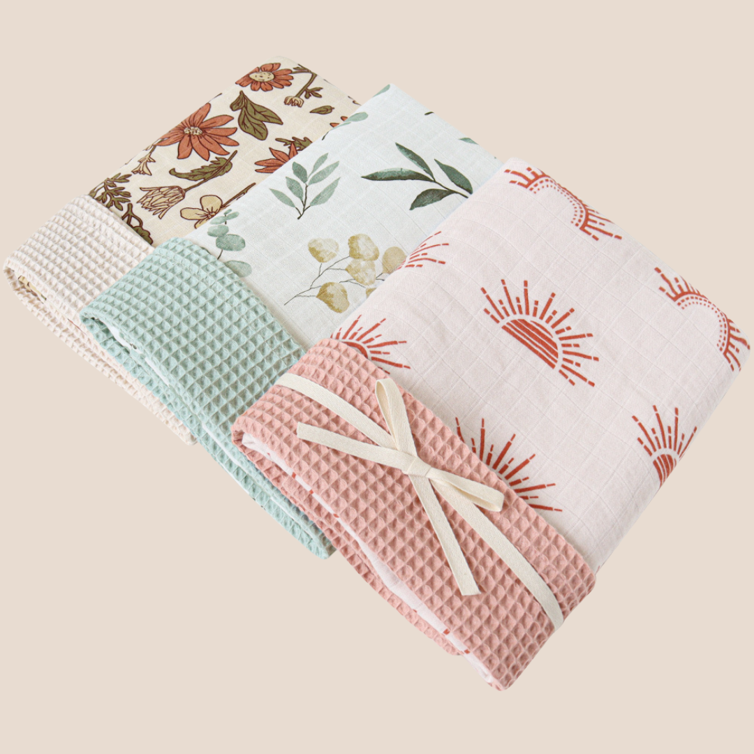 Sunrise bamboo baby swaddle blanket with pink waffle cotton backing – soft, breathable and eco-friendly