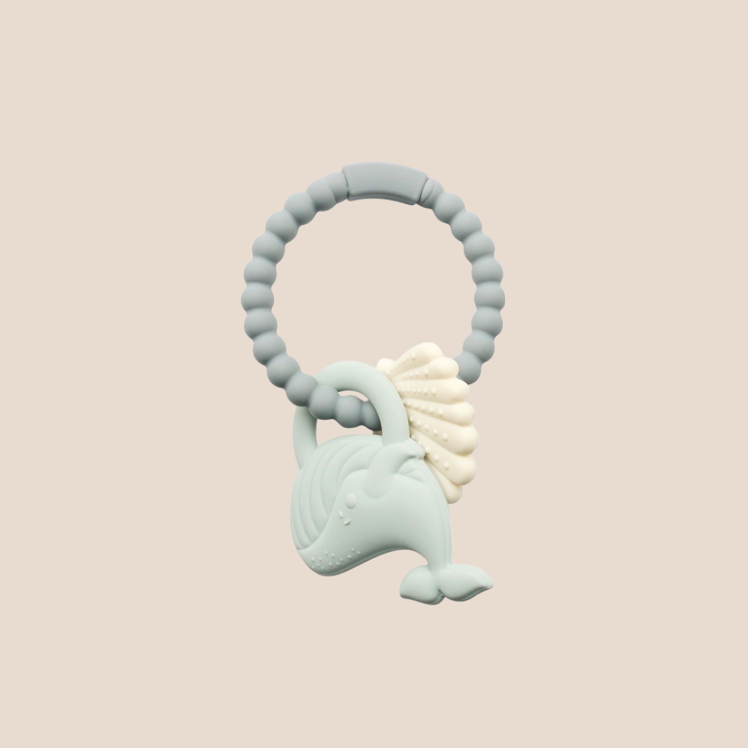 Teething toy with a light blue design on a beige background
