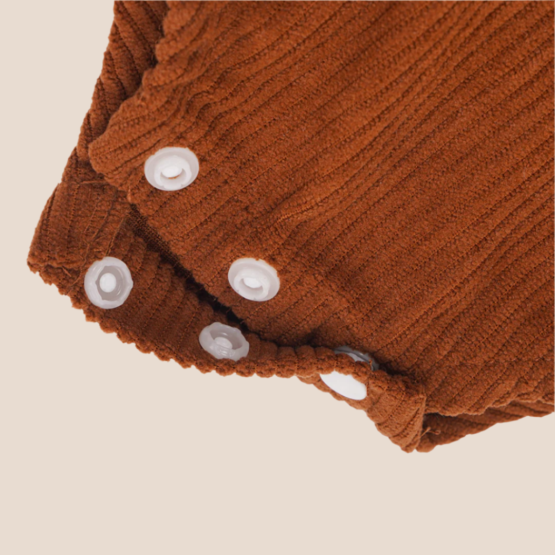 fall baby romper black baby corduroy romper buttons close up