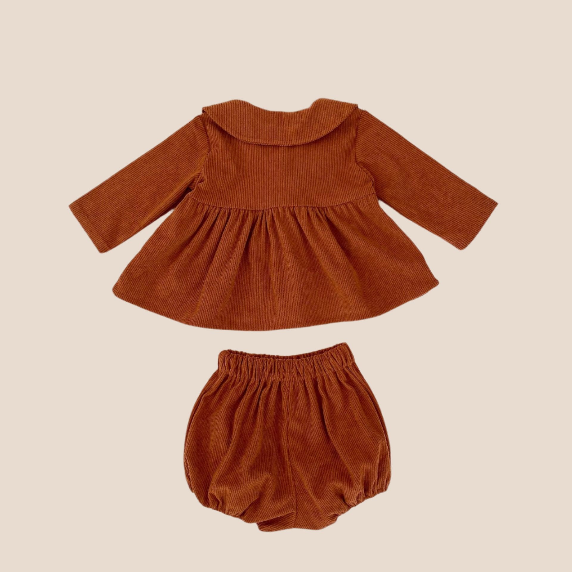 Baby girl romper and dress back view