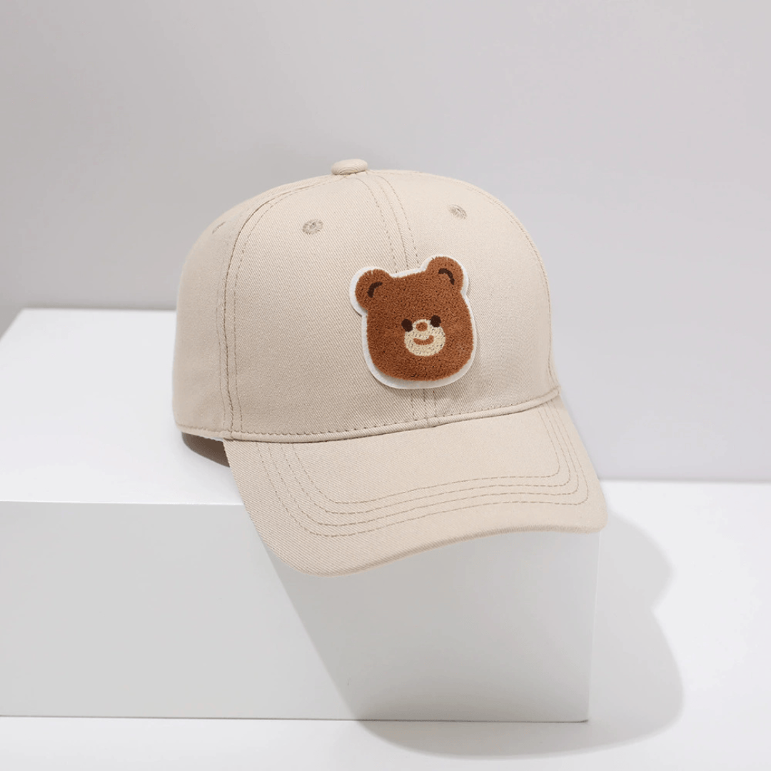 Neutral baby hat with teddy bear patch