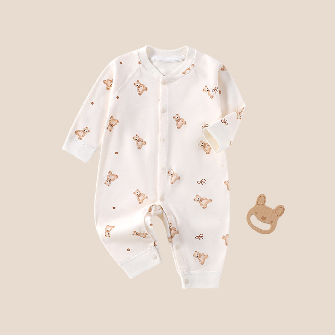 Neutral teddy bear baby romper with full snap closure for newborn gift box