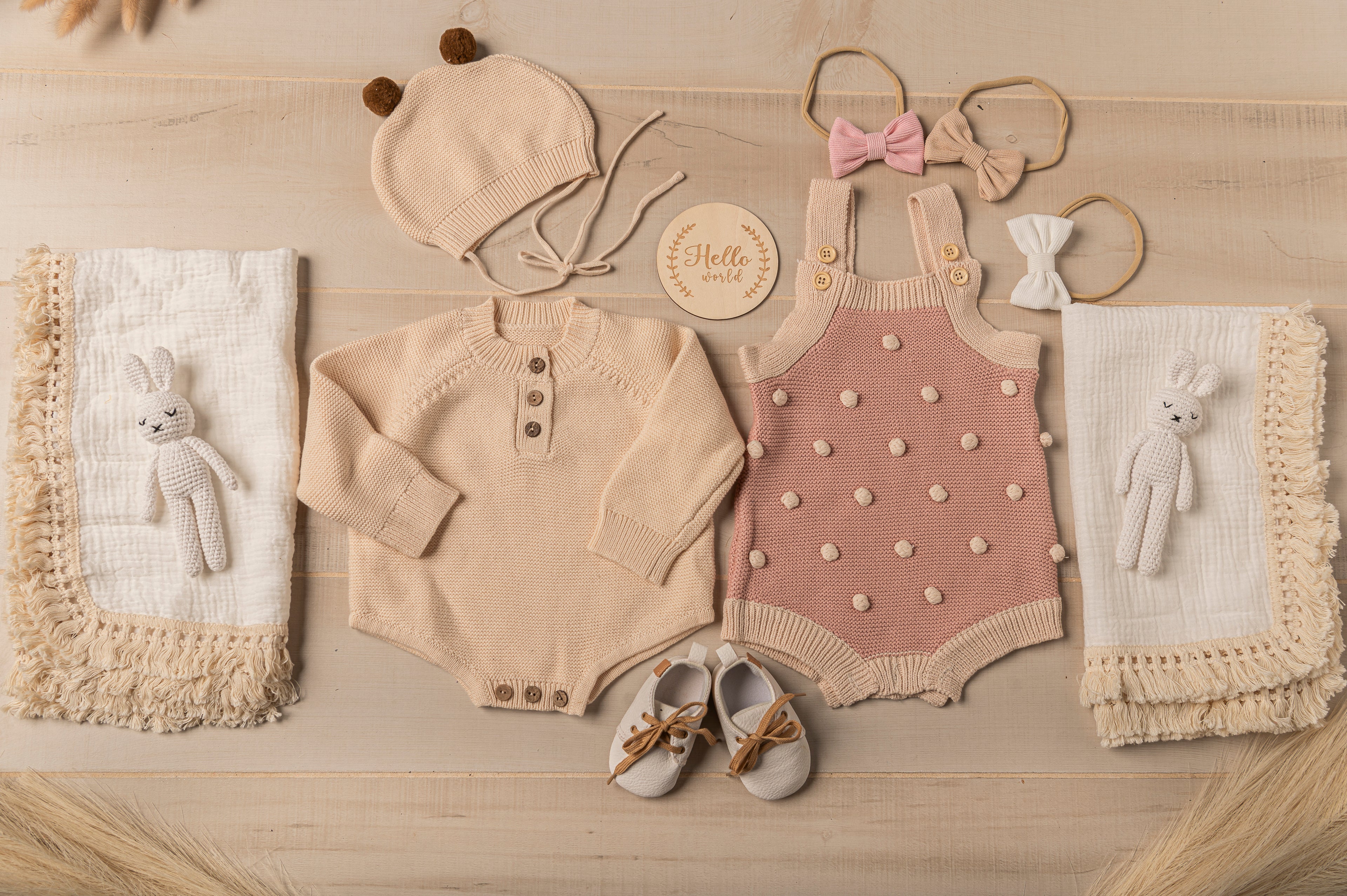 Complete baby gift basket set for newborns featuring neutral tones: soft romper, handmade baby shoes, bunny plush toy, and cozy knit blanket in a white keepsake box. Thoughtful gift for expecting parents, baby registry, or baby shower. For baby girl, baby boy and gender neutral gifting