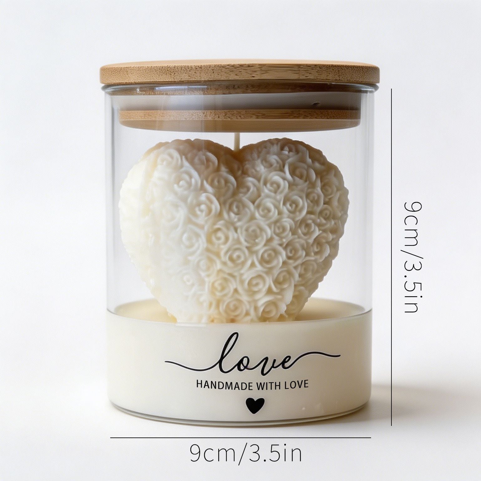 Luxury handmade soy wax candle featuring a rose-pattern heart suspended inside a clear glass jar with a natural bamboo lid, elegant gift for home décor and special occasions.