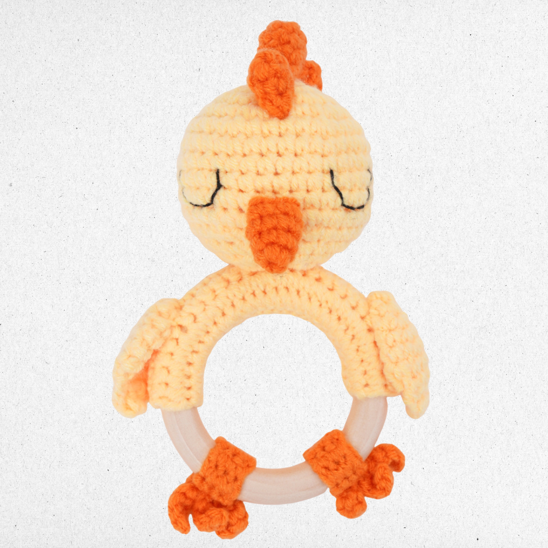 hand-knitted chick baby toy with cotton yarn and a non-toxic beech wood ring front view