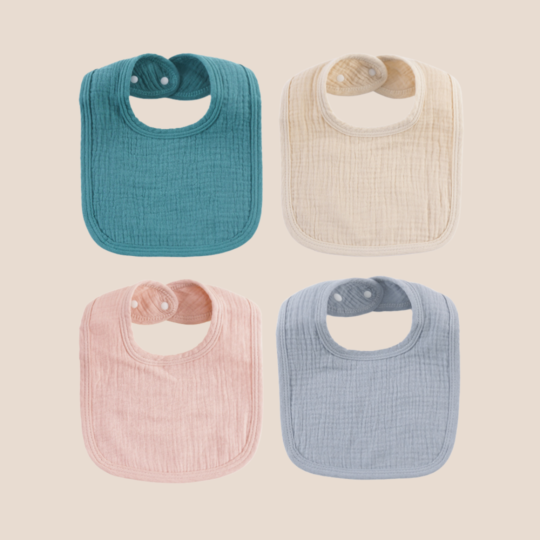 100% cotton adjustable baby bibs in 4 different colors