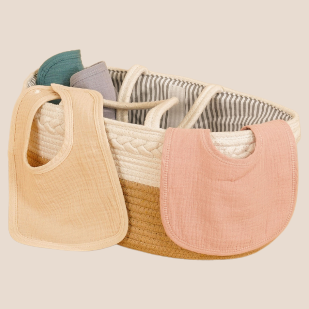 100% cotton adjustable baby bibs in basket