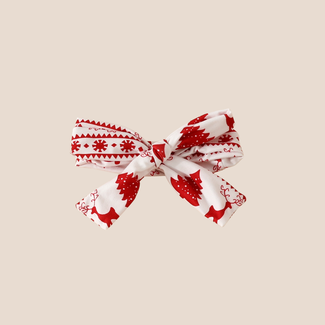 Matching bow headband in red and white Christmas print