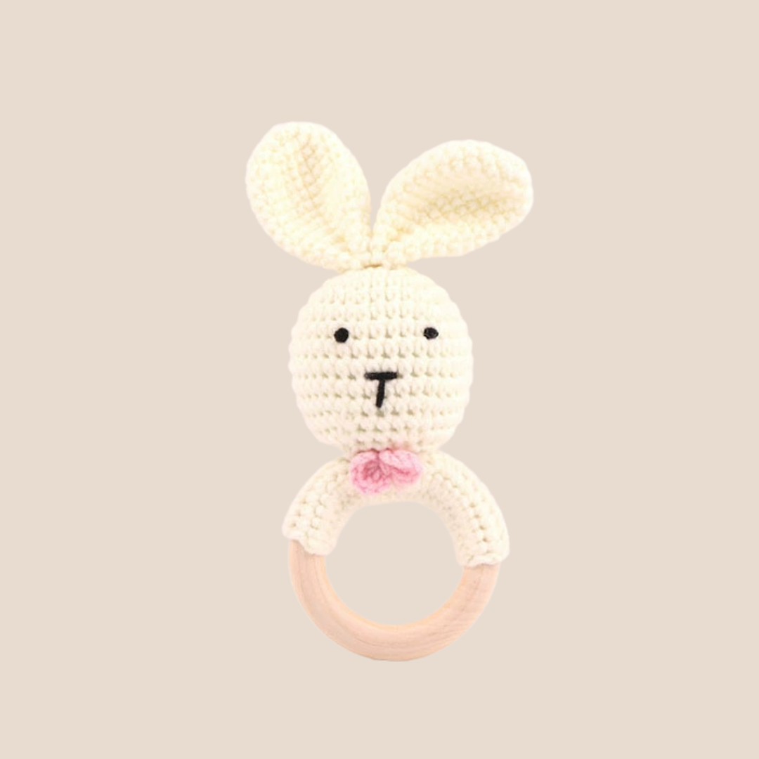 Handcrafted crochet bunny wooden baby teether with a natural beechwood ring.