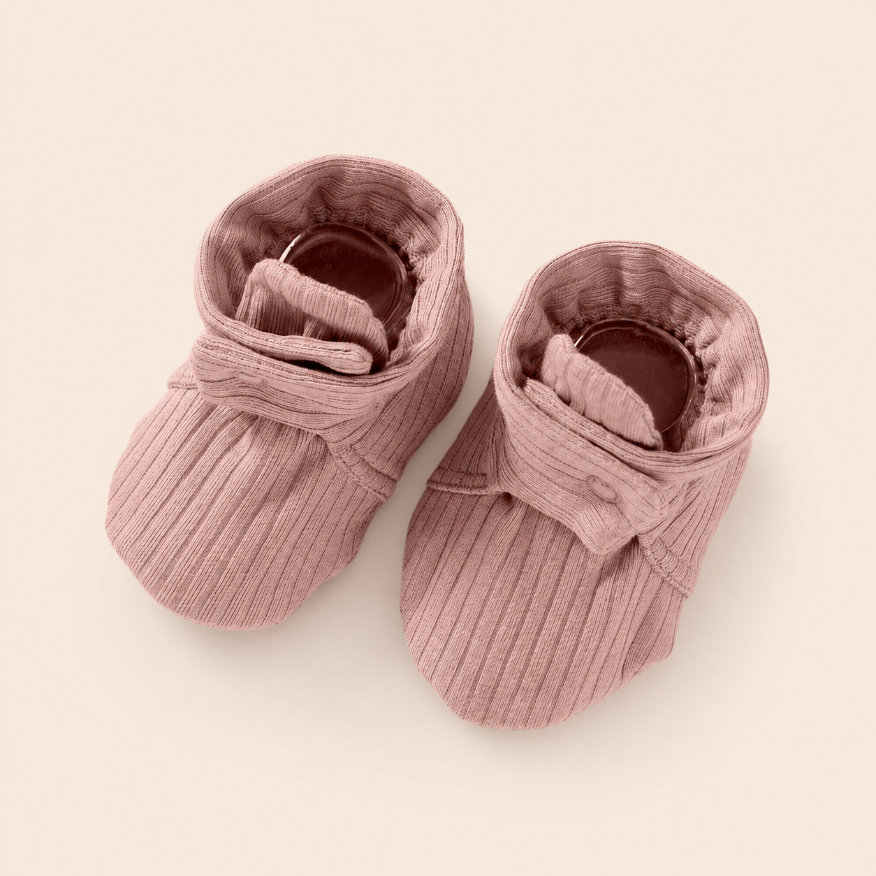 Organic Cotton Muslin Baby Adjustable Booties with snap closure for babies 3–6 months.