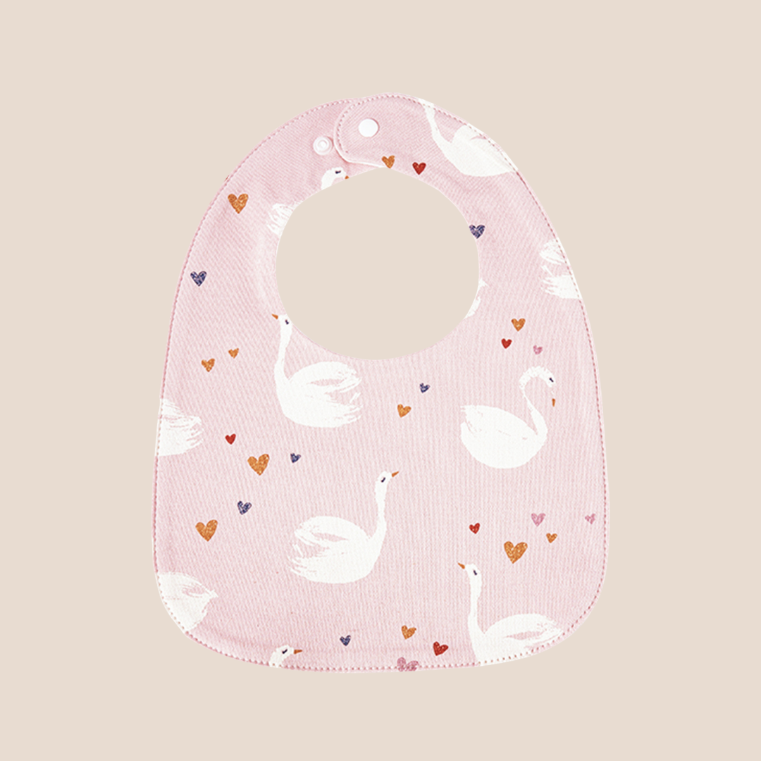 Organic Cotton Muslin Baby Bib with Adjustable Snap Closure featuring a blush swan print.