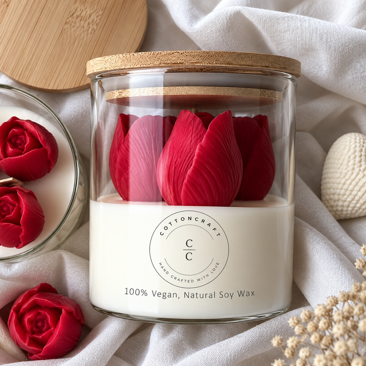 Romantic red tulip-shaped soy wax candle in a clear glass jar with Cotton Craft branding.